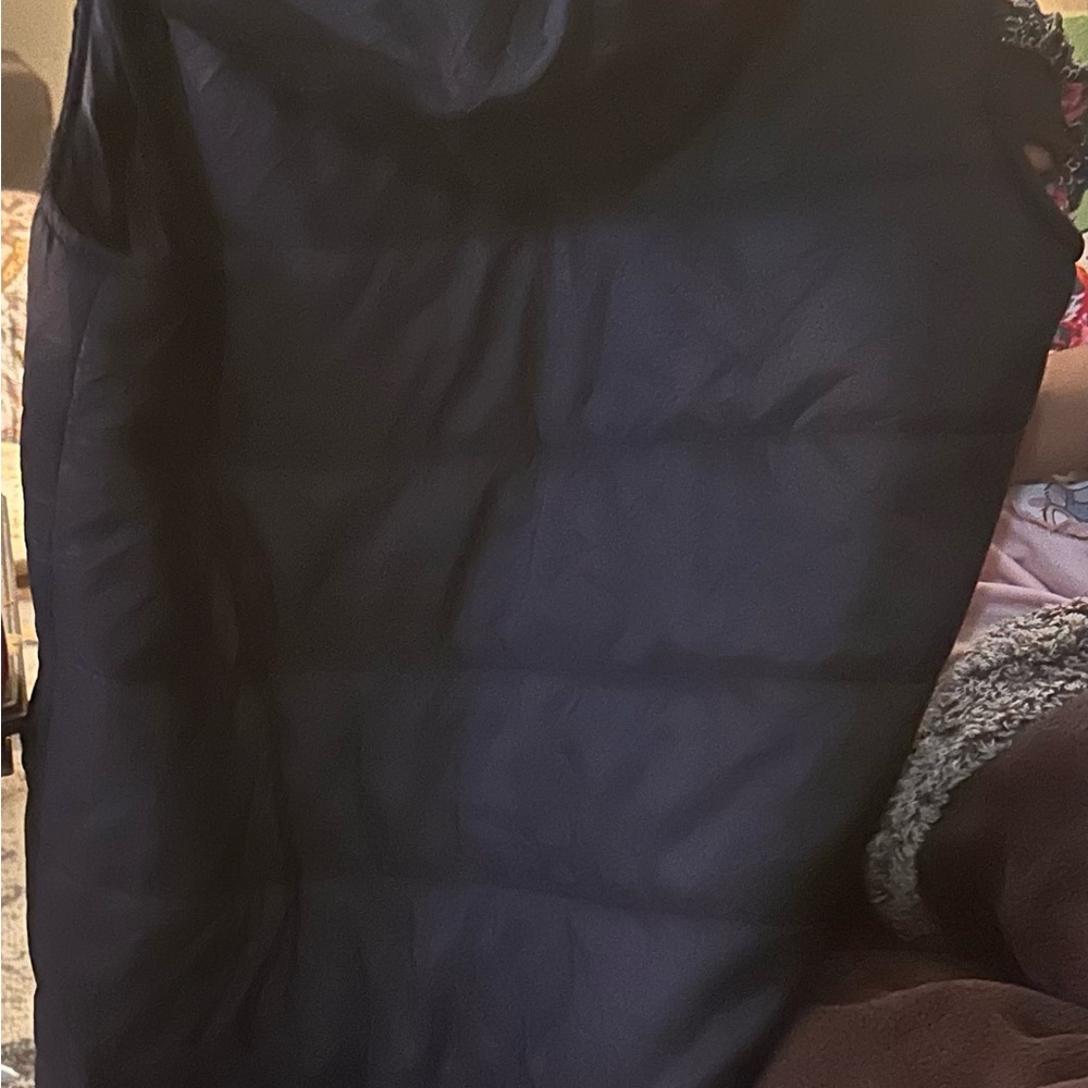 Long winter puffer vest with hood and pockets